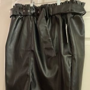 Fashion to Figure faux leather belted skirt with elastic waist band.